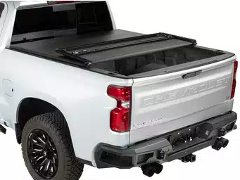 Extang Trifecta ALX soft folding tonneau cover on Aa white Chevy Truck.