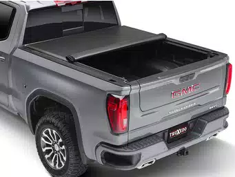 Truxedo Lo Pro QT soft roll up tonneau cover, featured on a grey GMC Sierra pick up truck.