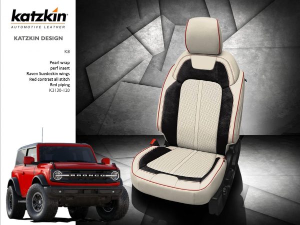 Katzkin Leather Interior for Ford Bronco. Pearl wrap, raven suedezkin wings, perf insert and red stitch.
